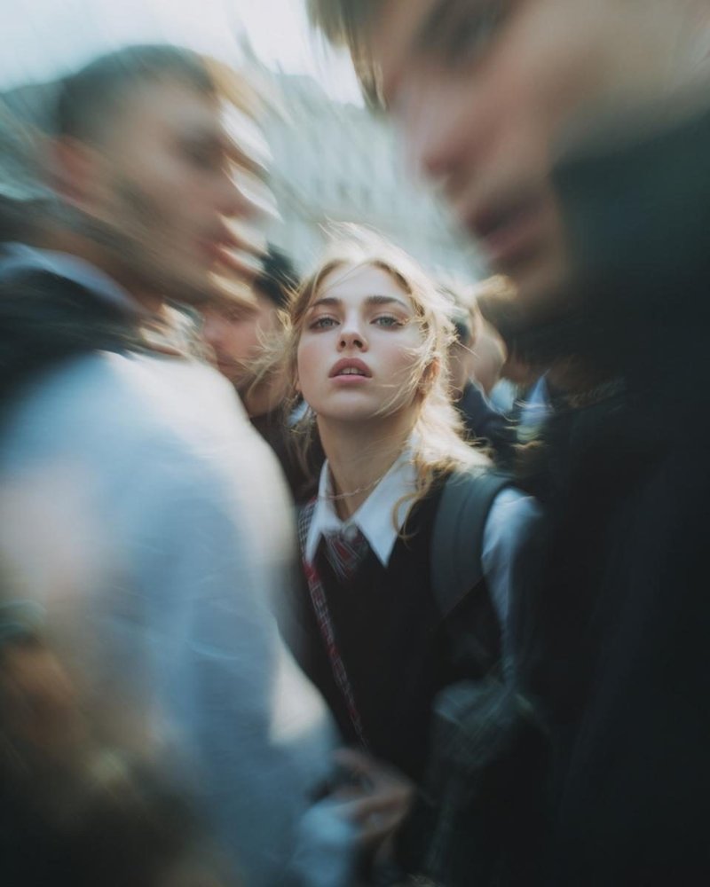 Paparazzi-style extreme close-up photo of a woman with striking facial…